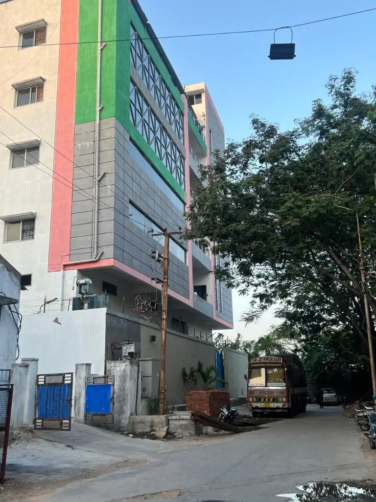 Hyderabad works — street view of the multi-storey manufacturing building
